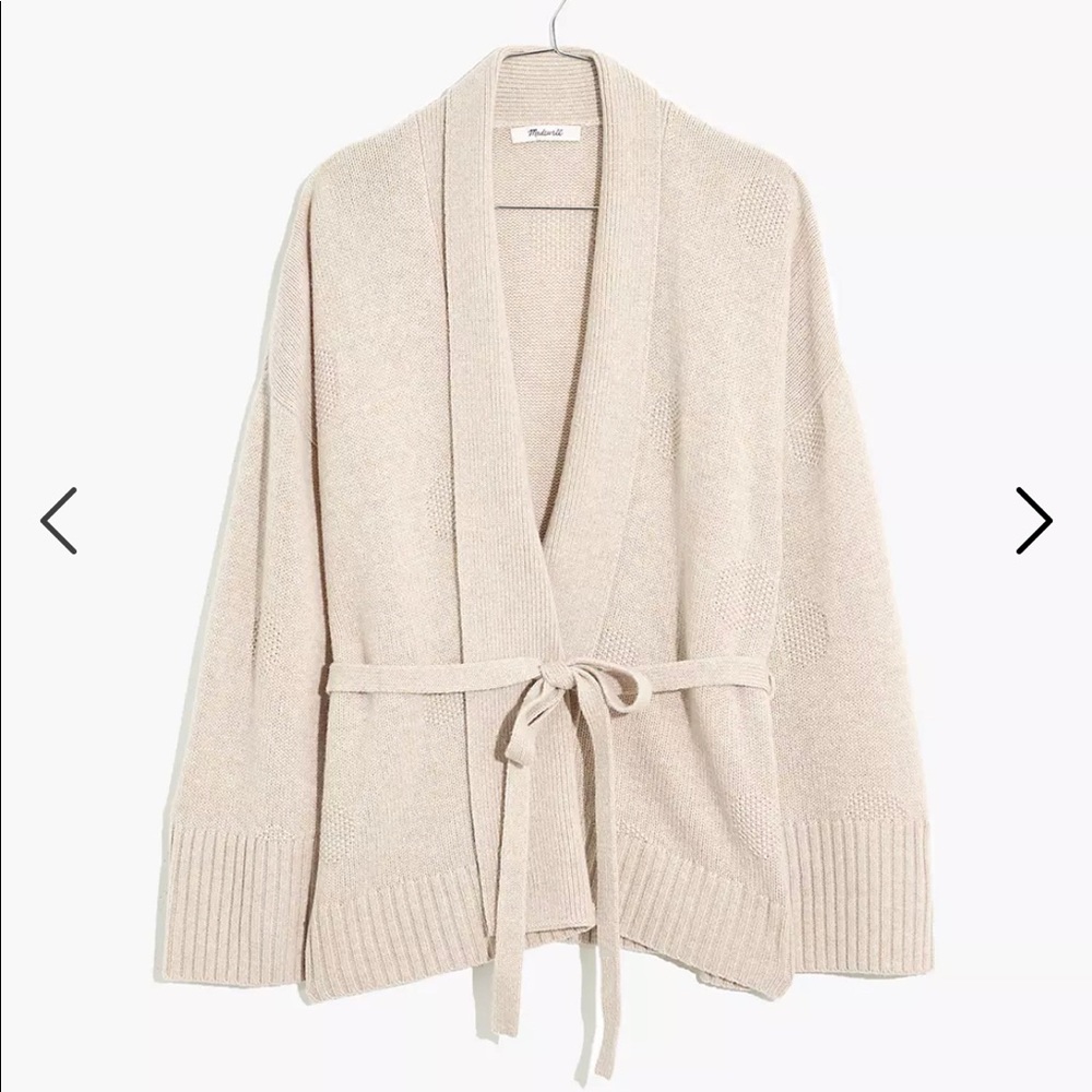 Madewell wrap sweater in oatmeal/cream color. The pattern has subtle polka dots